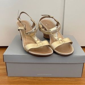 Gold metallic leather summer sandal wedges by Rockport